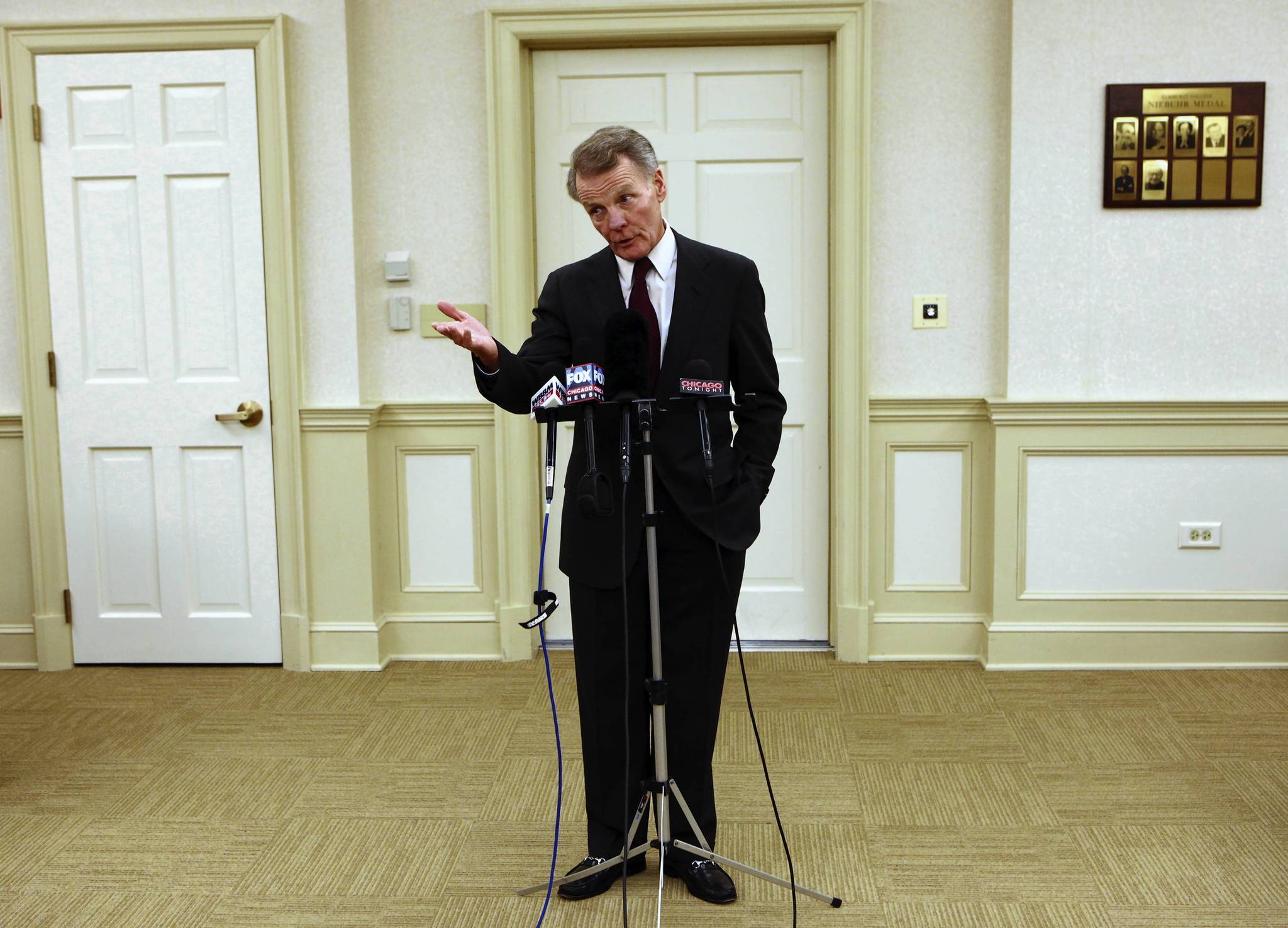 House Speaker Michael Madigan answers questions at a press availability...