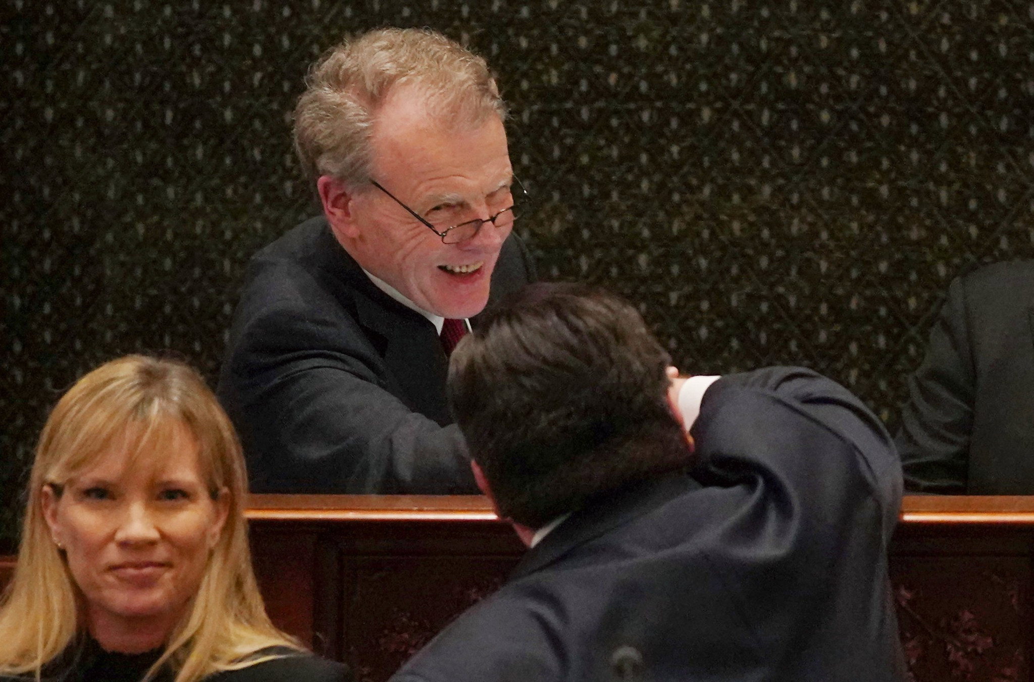 House Speaker Michael Madigan congratulates Gov. J.B. Pritzker after Pritzker's...