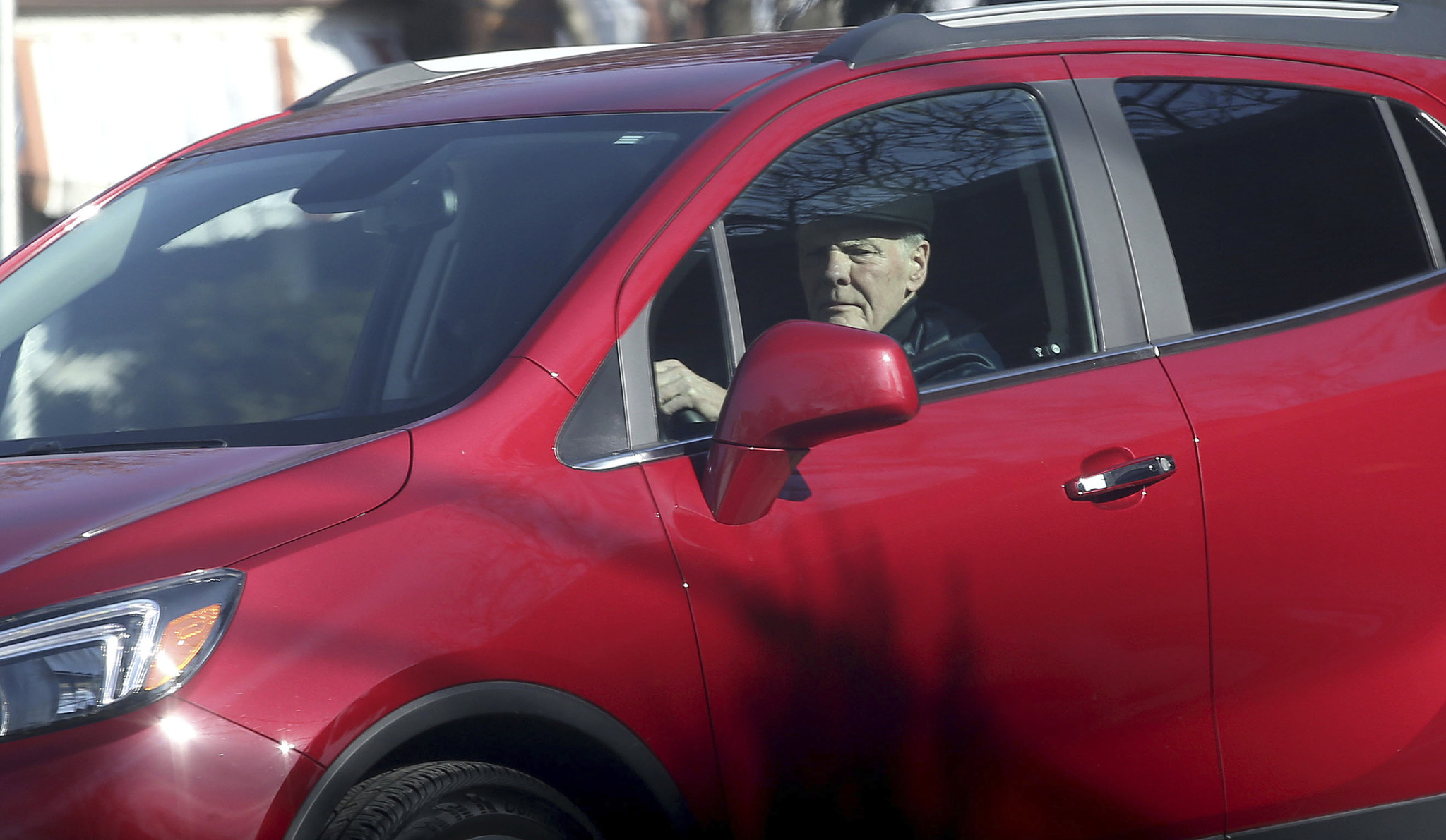 Michael Madigan arrives to his West Lawn home on March...