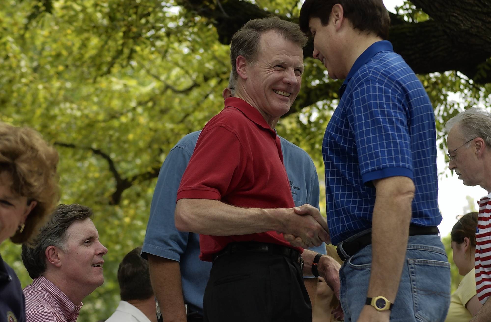 House Speaker Michael Madigan, left, greets Gov. Rod Blagojevich on...