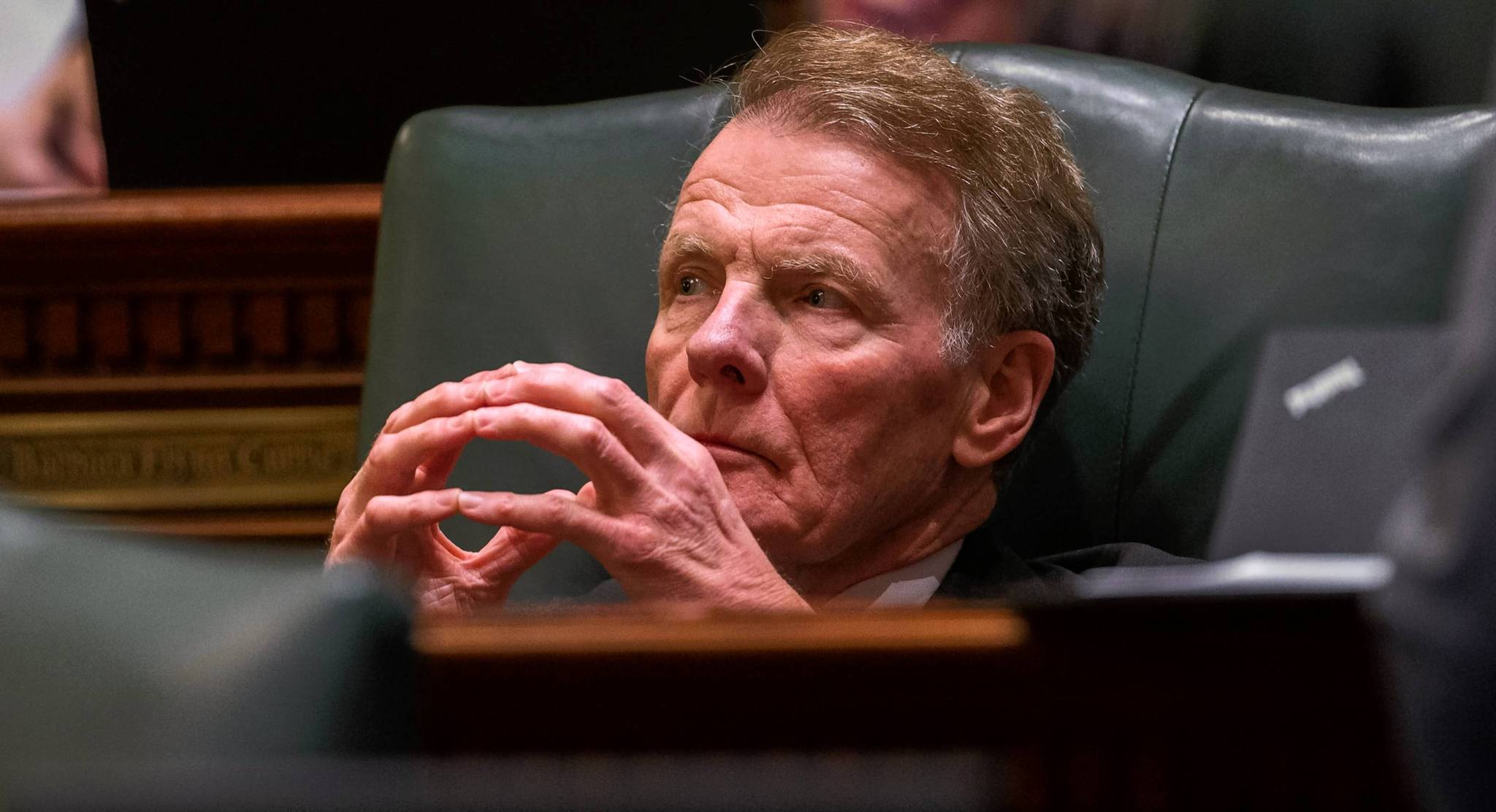 House Speaker Michael Madigan listens Dec. 3, 2013, after introducing...