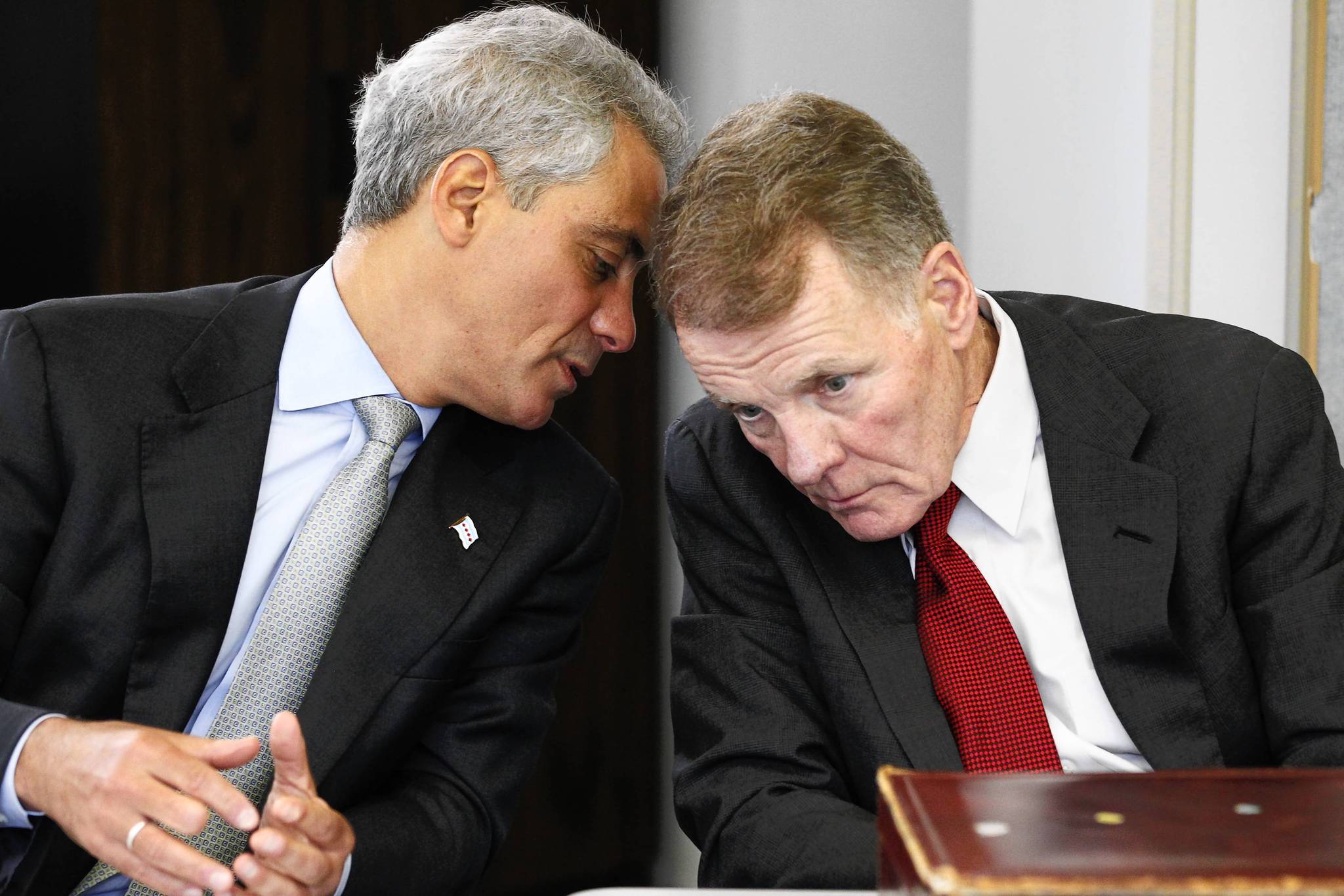 House Speaker Michael Madigan, right, talks with Chicago Mayor Rahm...