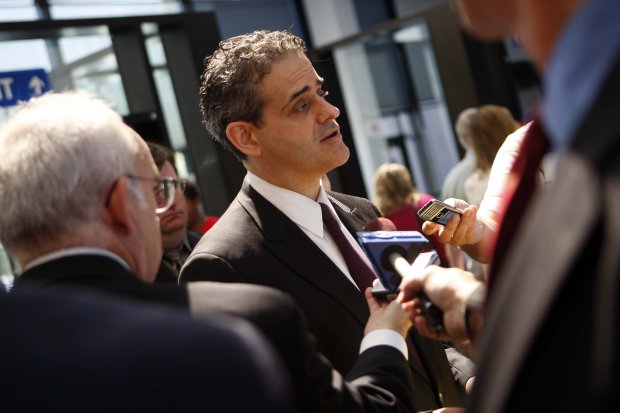 Jack Blakey, center, head of special prosecution, speaks to the media regarding a grand jury indictment in the lobby of the Cook County Criminal Courts building in Chicago on on Aug. 6, 2009. (José M. Osorio/Chicago Tribune) .